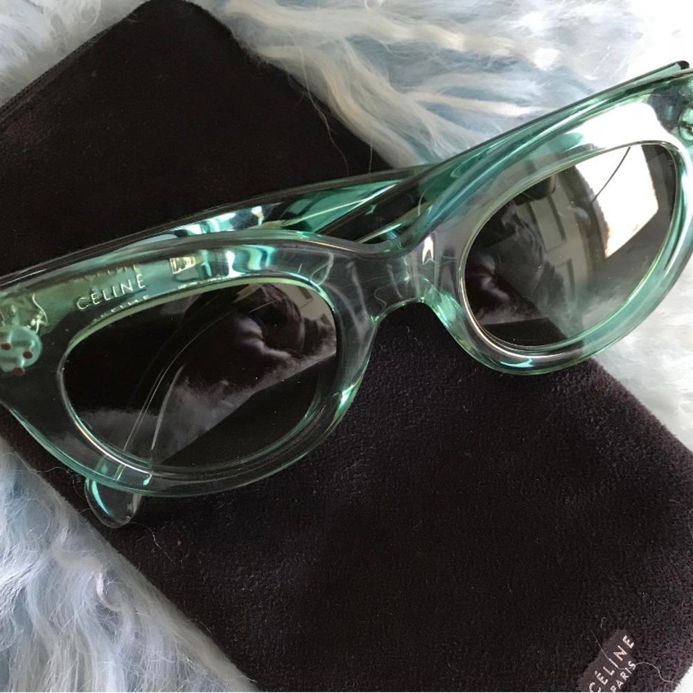 Brand new Celine Paris sunglasses, mint color with case. Perfect condition.